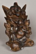 A Chinese carved wood mask