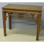 A 19th century Chinese elm table The pa