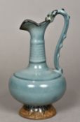 A Chinese porcelain ewer With ribbed ne