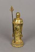 A Chinese gilt bronze figure of a deity