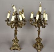 A pair of 19th century bronze candelabra