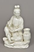 A Chinese blanc de chine porcelain figur