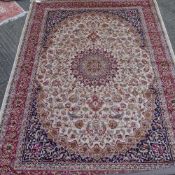 A beige ground Keshan carpet 2.80 x 2.