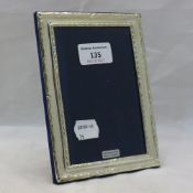 A silver photograph frame