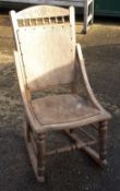 An early 20th century rocking chair