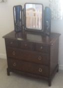 A Stag chest of drawers and a mirror