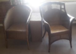 Two Lloyd Loom chairs and a linen basket