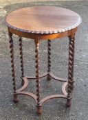 An oak barley twist centre table