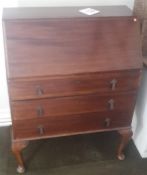 An early 20th century mahogany bureau