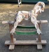 A wooden rocking horse