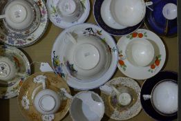 A quantity of Victorian porcelain cups and saucers