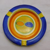 A Clarice Cliff bizarre ashtray with gold back stamp