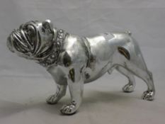 A silvered coloured model of a bulldog