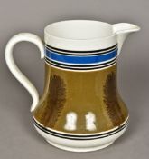 A large 19th century mocha ware jug Of spreading form,