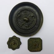 Three Chinese bronze roundels