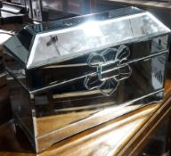 A mirrored casket