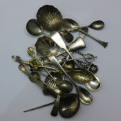 A collections of silver spoons