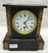 A Victorian slate mantel clock