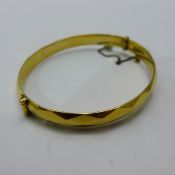 A 9 ct gold metal cored bracelet