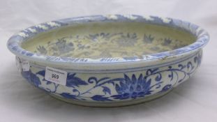 A Chinese blue and white shallow porcelain bowl