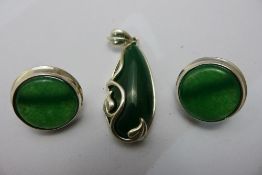 A jade pendant and earrings