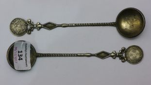 Two Chinese coin spoons