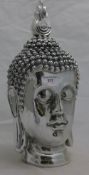A silvered Buddha head