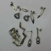 Four pairs of Ortac silver earrings and a silver bracelet