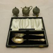 A cased silver christening set and a three piece Indian cruet