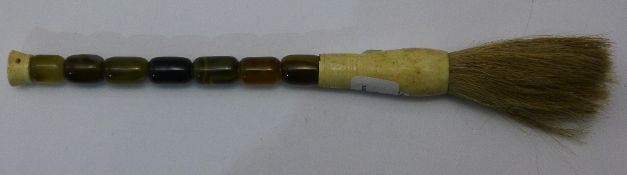 An agate handled brush