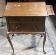 An early 20th century mahogany silver table