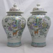 A pair of Chinese lidded vases