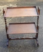 A barley twist two tier folding tea trolley