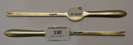 A pair of silver lobster picks