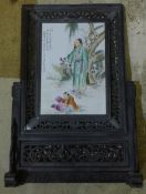 A Chinese porcelain table screen