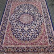 A blue ground Keshan rug 1.90 x 1.