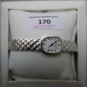 A cased 18 ct white gold Christian Bernard watch