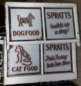 A pair of painted windows advertising Spratts Pet Food