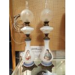 Two opaline glass oil lamps decorated with Napoleon and Josephine