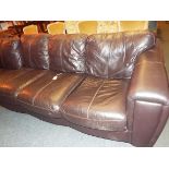 A brown leather five-seater corner group