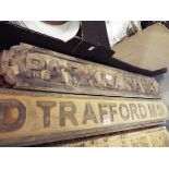 Three reproduction wooden road signs for Park Lane, Brick Lane and Victoria,