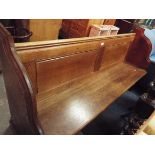 An oak church pew