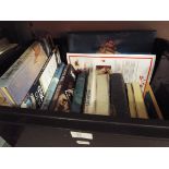 A box of mainly hardback books on boats, ships, sailing,