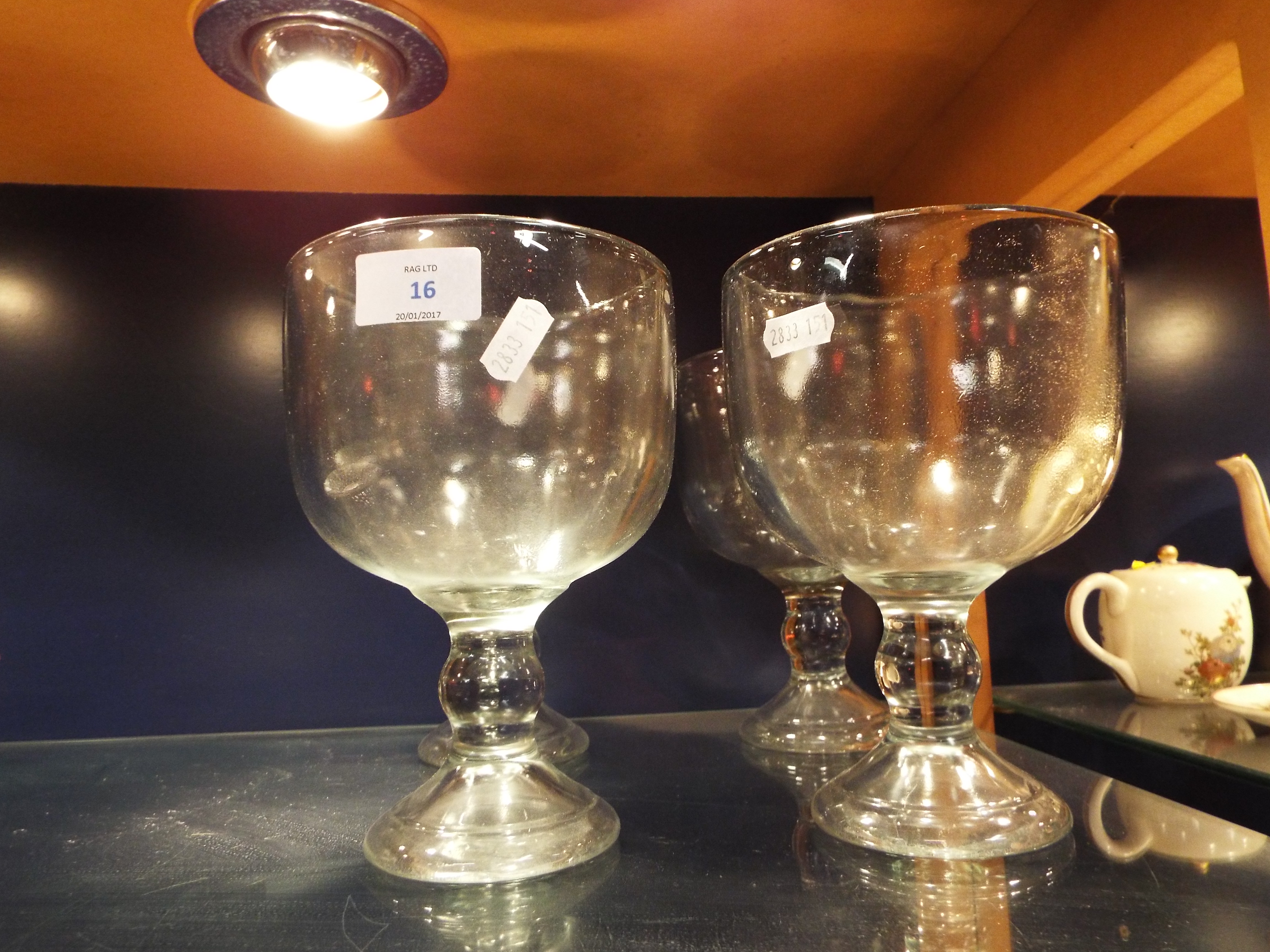 Four large 20thC rummer style glasses with knop stems