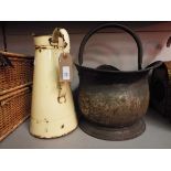 A coal bucket together with an enamel jug