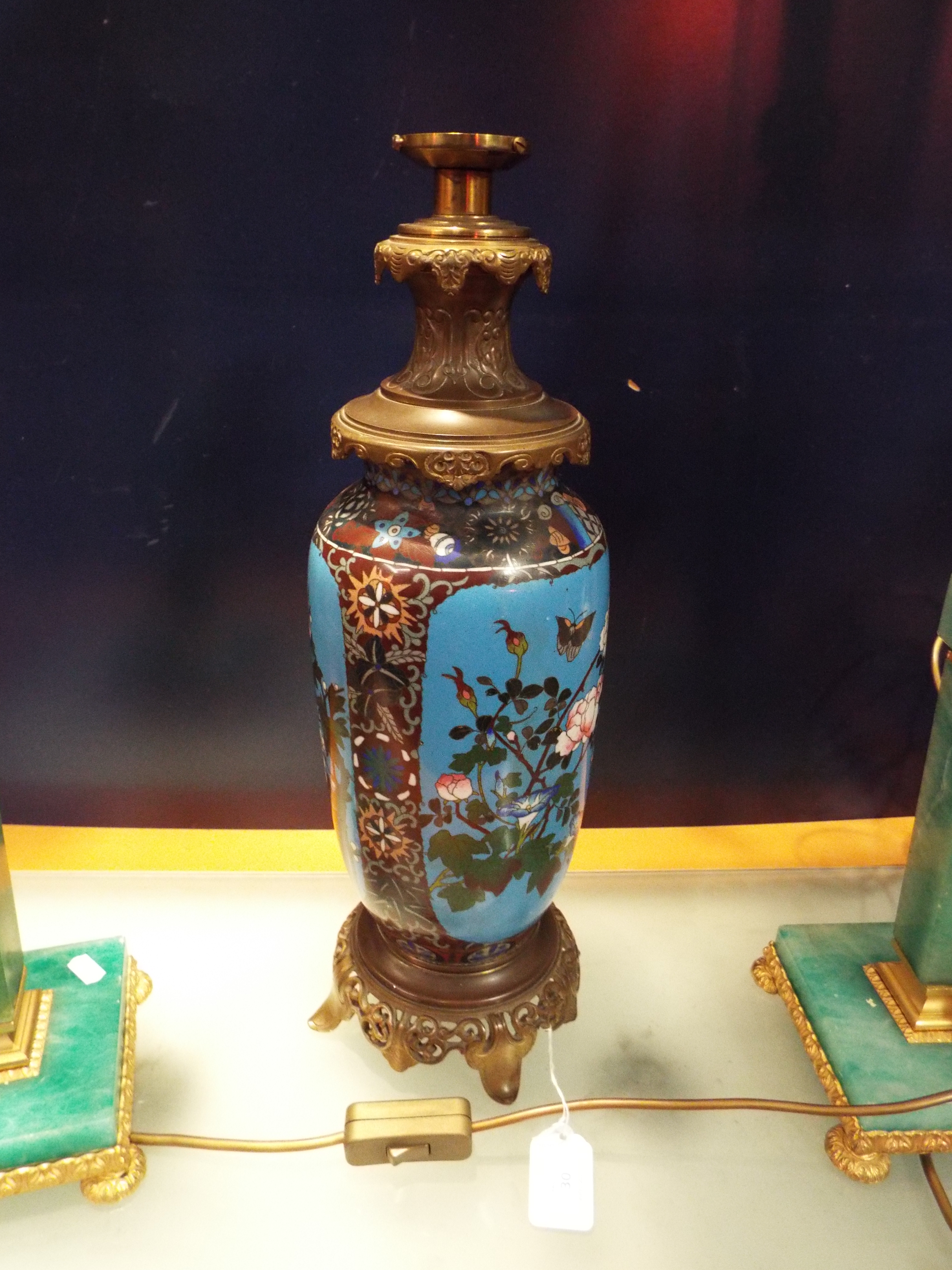 A 20thC cloisonne and bronze mounted lamp having pictorial panel depicting birds,