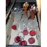 A mixed selection of glassware to include three carnival glass vases, a Royal Doulton crystal jug,