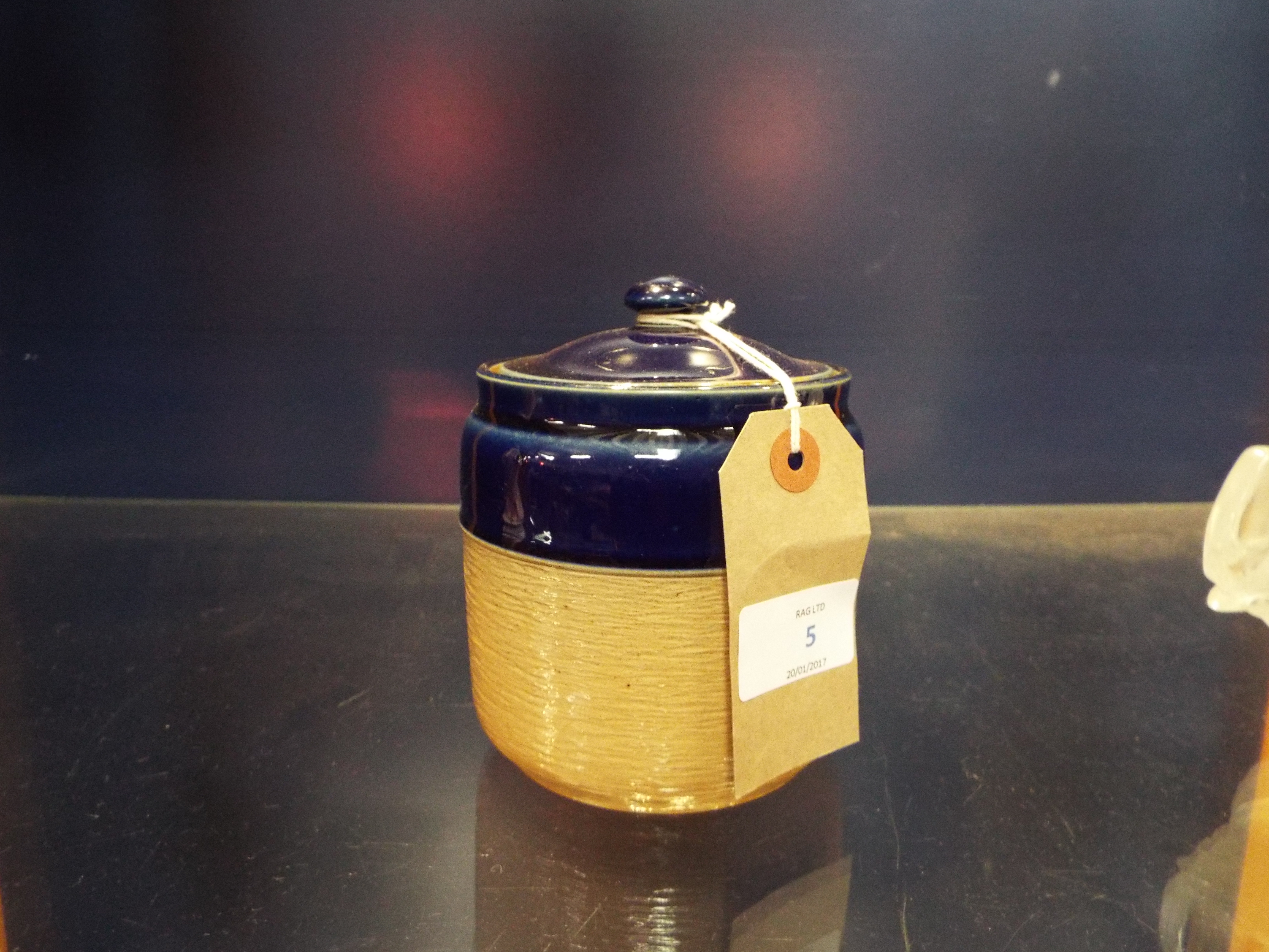 A Royal Doulton blue glazed stoneware tobacco jar