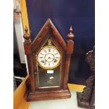 A Victorian steeple mantel clock