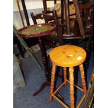 A pine stool together with a mahogany turned wine table